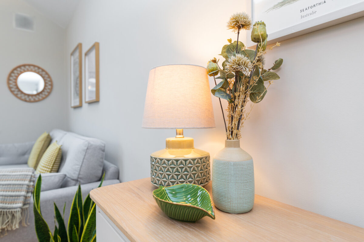 Stylish sideboard with ceramic lamp and dried flowers in EirStay corporate accommodation Donnybrook Dublin 4