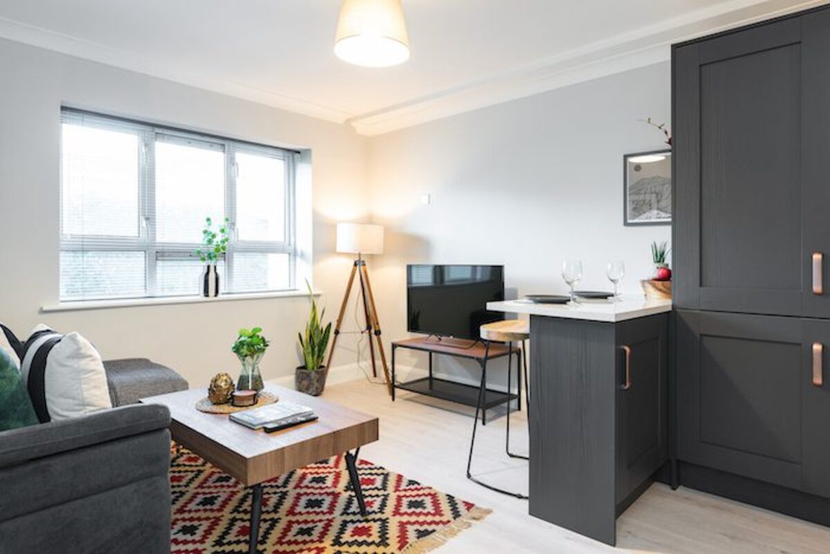 Spacious master bedroom with double bed in EirStay Lombard serviced apartment Dublin 2 short-term rental