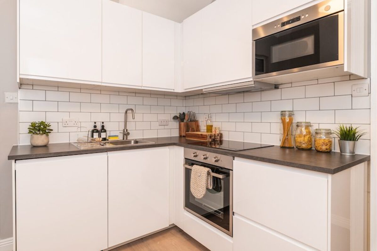 Fully equipped kitchen with subway tiles and oven in EirStay short-term accommodation Ranelagh Dublin 6